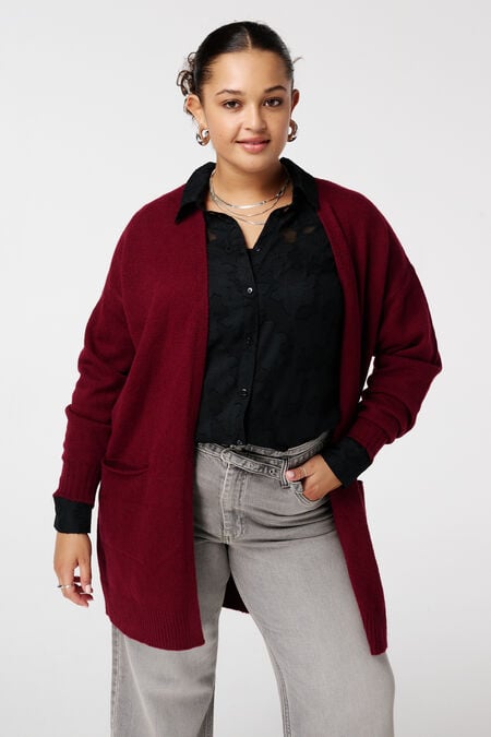 Halblange Strickjacke mit Seitentaschen Halblange Strickjacke mit Seitentaschen