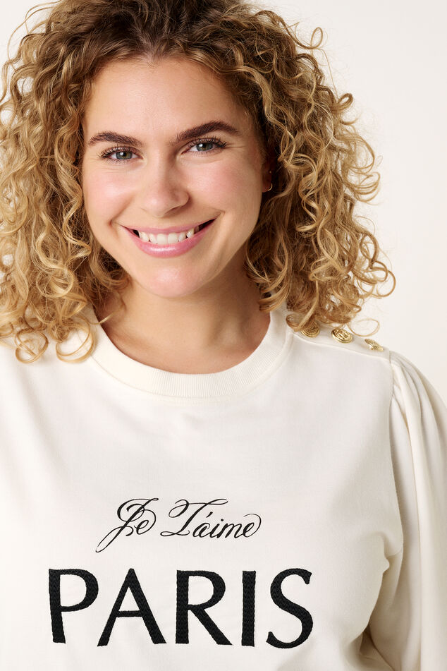 Pull "Paris" et des détails de boutons sur l'épaule image number 4