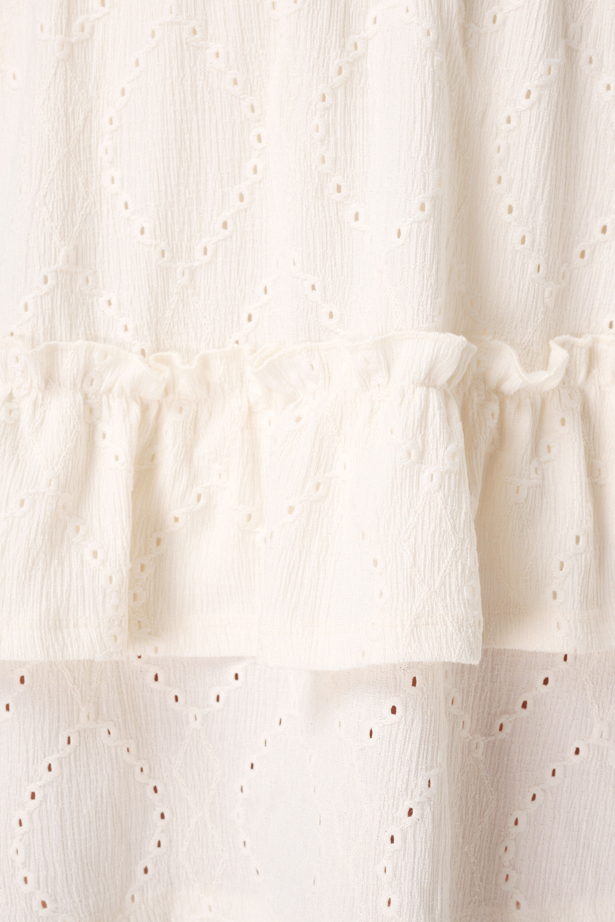 Rock im Broderie-Look