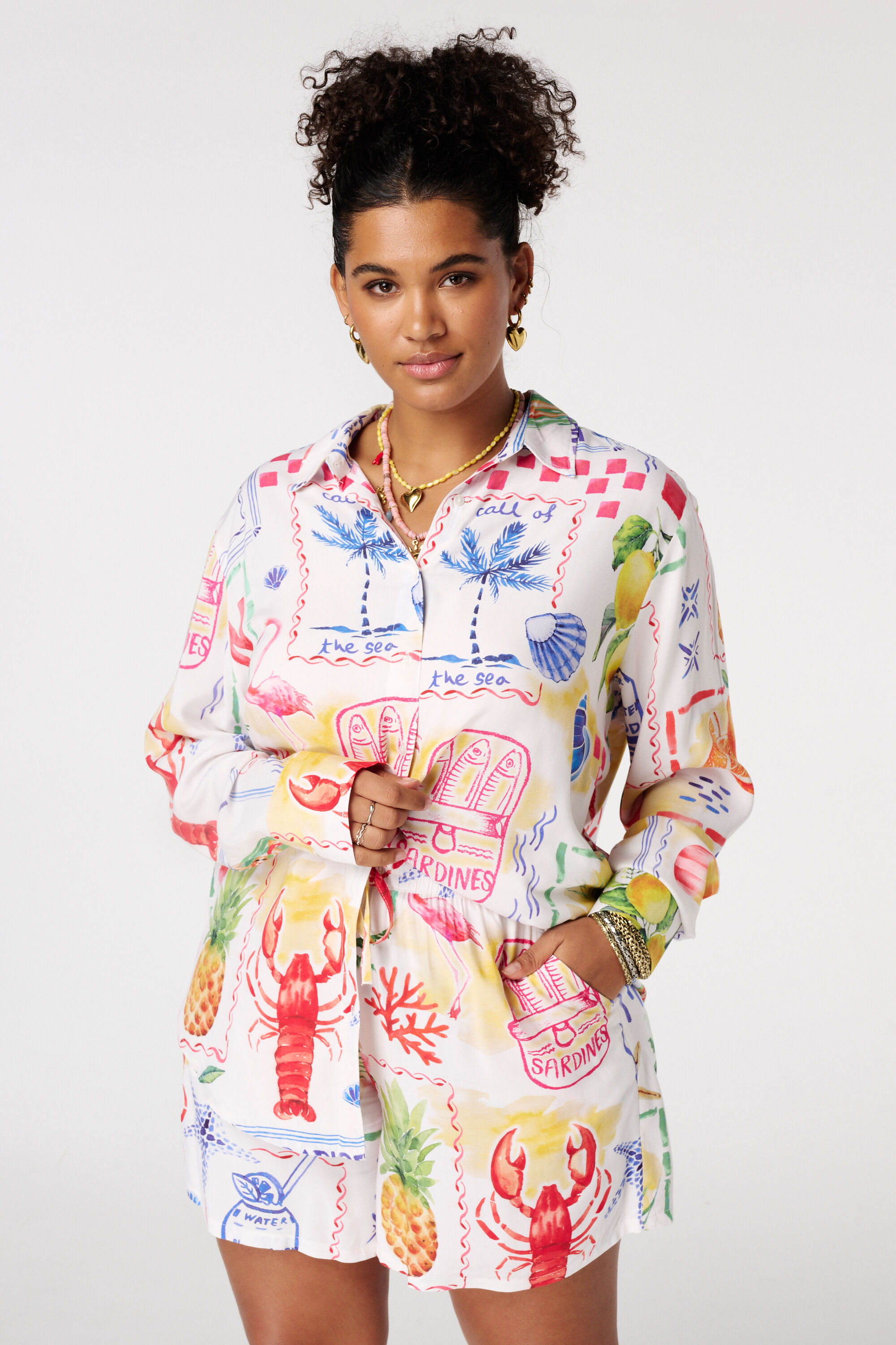 Bluse mit tropischem Print