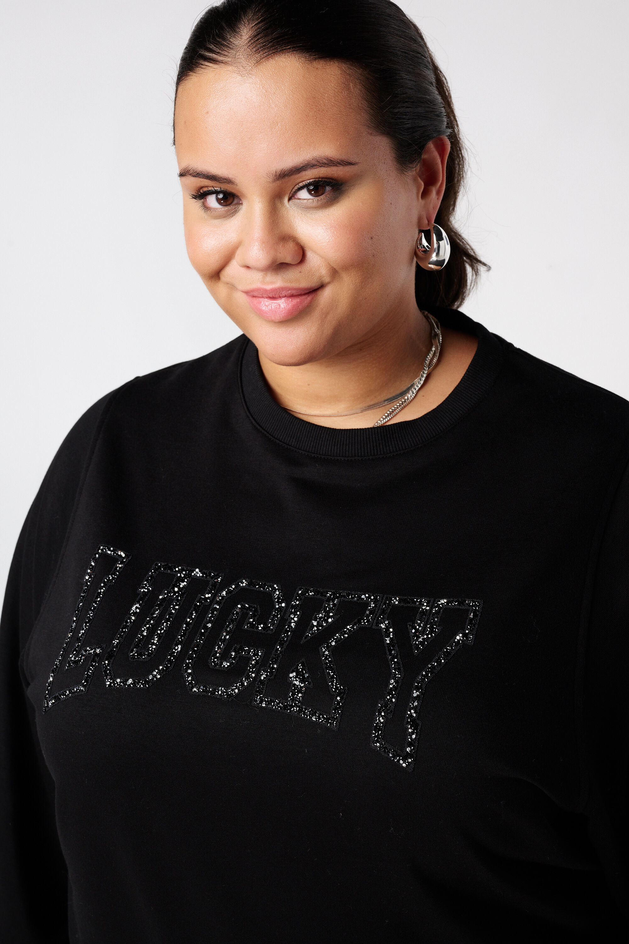 Sweatshirt mit Glitzertext image number 4