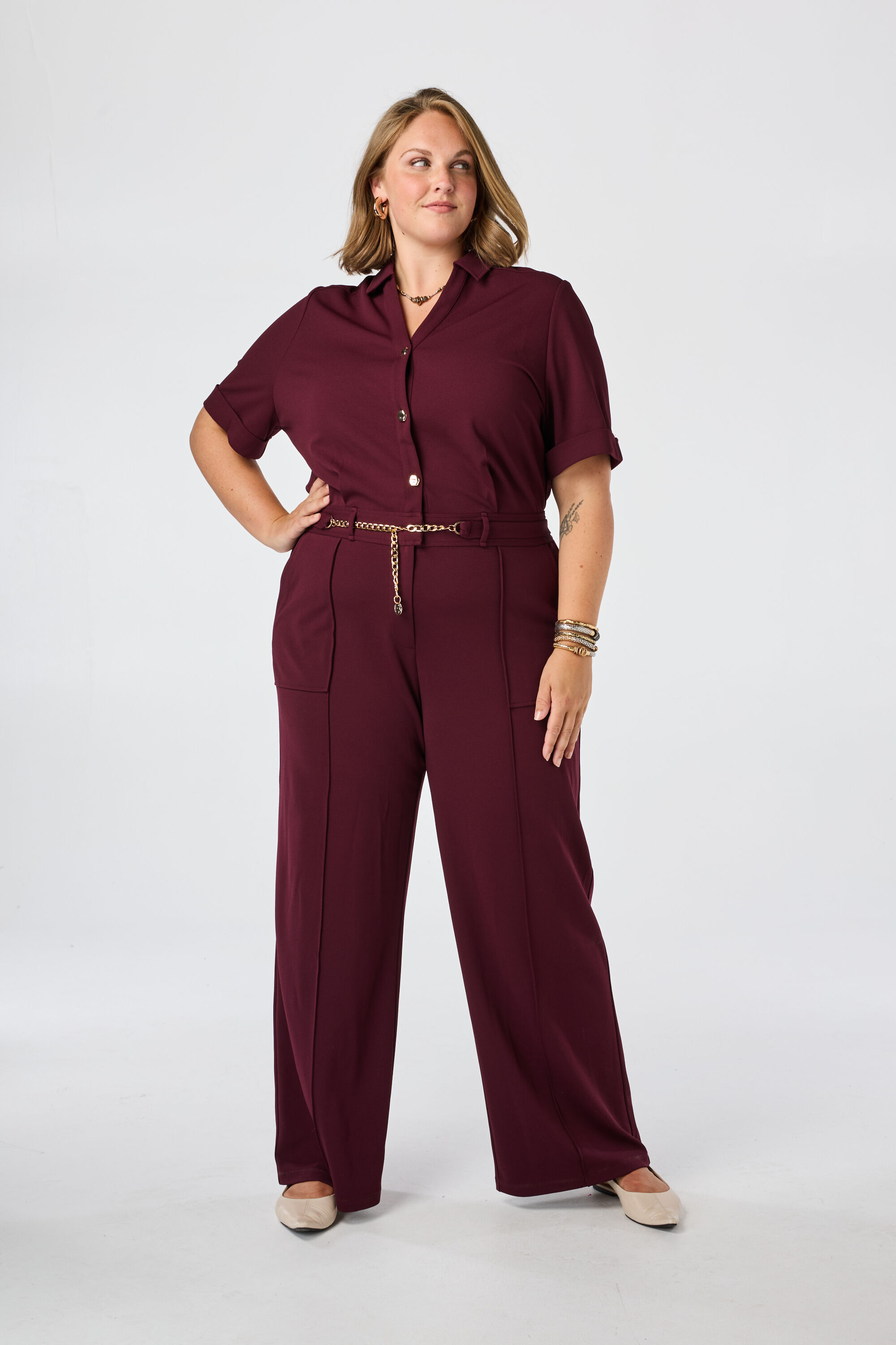 Jumpsuit mit goldenem Ketteng&uuml;rtel